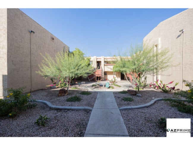 Building Photo - Fall In Love With This Stunningly Upgraded 1/1 First-Floor Phoenix Condo, Designed For Effortless Li