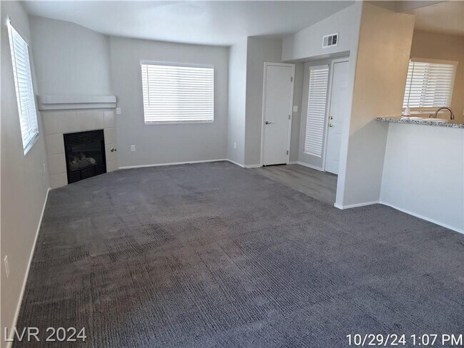 Building Photo - SECOND-FLOOR UNIT IN A GATED SOUTHWEST COM...