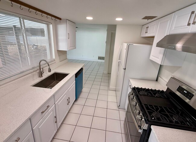 Building Photo - Beautifully Renovated 4-Bedroom Home with Large Backyard & 2-Car Garage