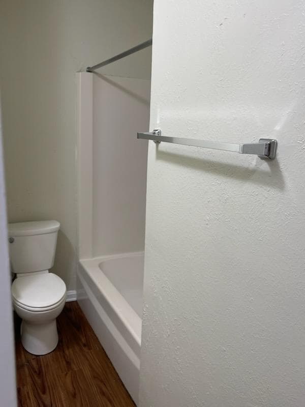 Building Photo - AVAILABLE NOW. GRANITE COUNTERTOPS. Spacious single-level Townhome with upgraded flooring throughout