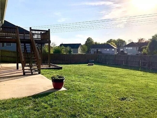 Building Photo - Spacious 4-Bedroom Greenwood Home with Vau...