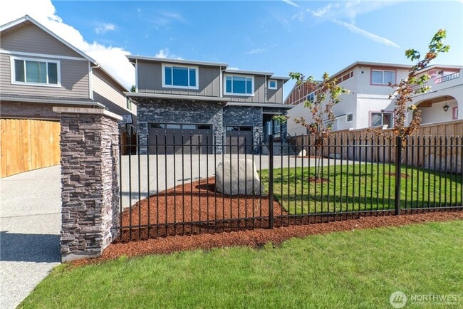 Building Photo - Luxury NW Living: 4 Bedroom Masterpiece with Dual Suites and Private Yard in Desirable Browns Point!