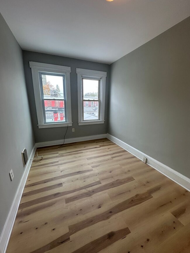 Building Photo - Beautifully Renovated 3-Bedroom Twin Home with Spacious Layout & Fenced Yard