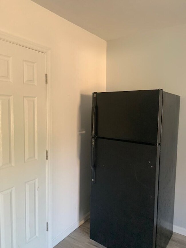 Building Photo - TRI-PLEX