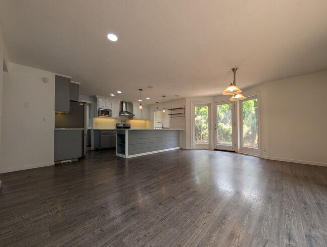 Building Photo - Updated 3-Bedroom, 2.5-Bath Home ~ Solid Surface Flooring and Spacious Kitchen!