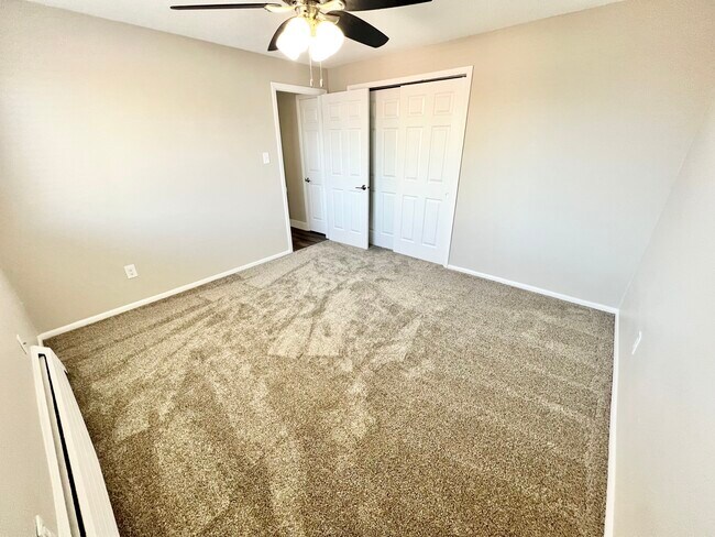 Step into this inviting bedroom, perfect for relaxation and personal retreat. - Wadsworth Station West