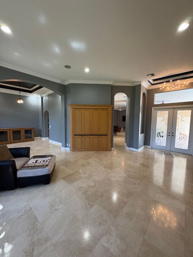 Building Photo - Spacious 3/3.5 3 car garage home in Palm City