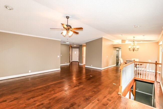 Building Photo - Beautiful 4 Bedroom, 3 Bath home. It has a 2 car garage plus a 1 car carport.  Stay warm in the w...