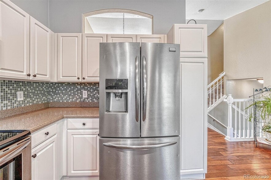 Updated kitchen overlooking the backyard - 16441 Martingale Dr