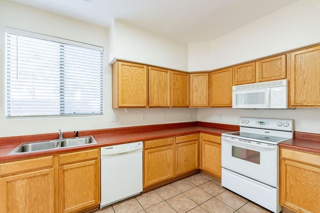 Building Photo - AVAILABLE JULY - Three Bedrooms + Loft!