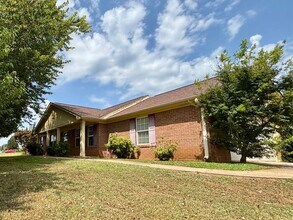 Building Photo - You will LOVE the fenced yard!