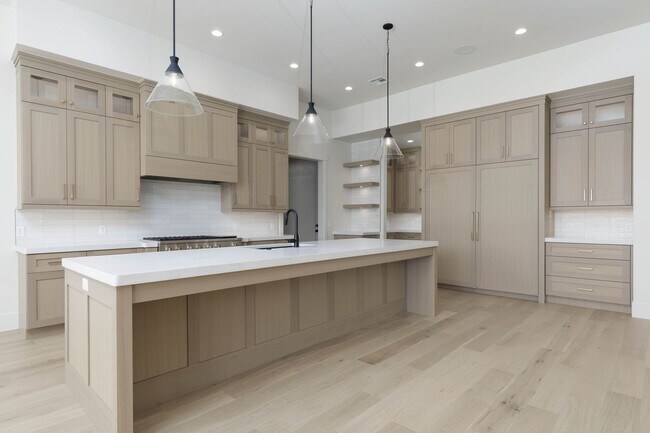 Building Photo - Gorgeous Custom Single Story with RV Garage