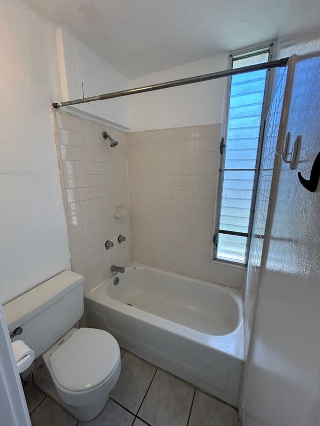 Building Photo - Upgraded studio available now in a secured...