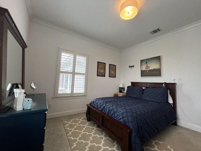 Building Photo - Luxury 4BR Home in Americana | 11 Ft Ceilings, Courtyard Living & Furnished Option