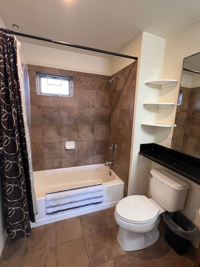 Building Photo - Top-Floor Ocean View Condo Across from the Beach | Furnished 2BR + Central A/C