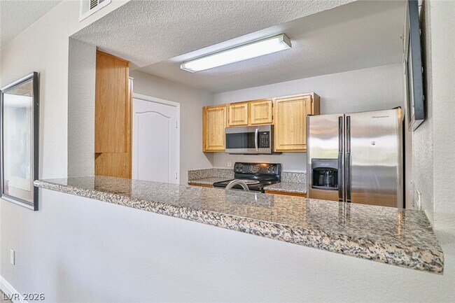 Building Photo - 5055 W Hacienda Ave