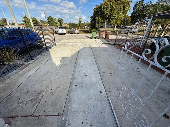 Building Photo - 7520 W 15th Ct