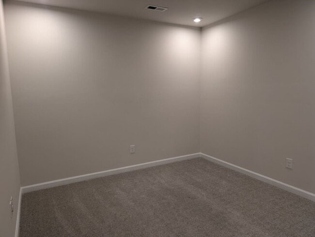 Building Photo - Elegant, Move In ready townhome located in...