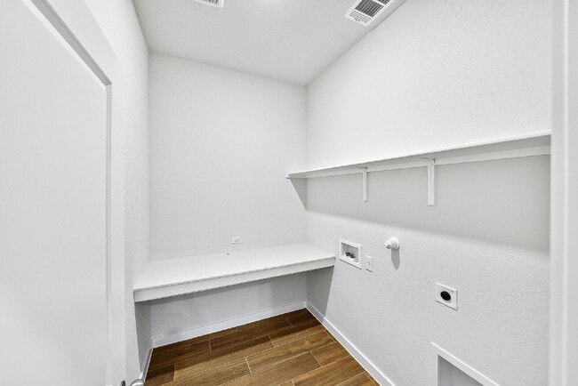 Building Photo - Greenbelt. 3 Car Garage. Built In Dog Room.