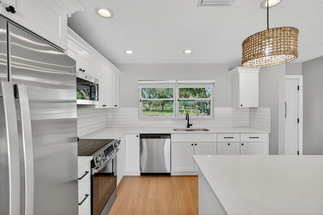 Building Photo - Fully Remodeled 3BR Home with Large Fenced Yard & New Deck