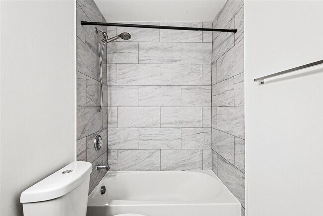 Building Photo - Modern Comfort Meets Convenience, Close to...