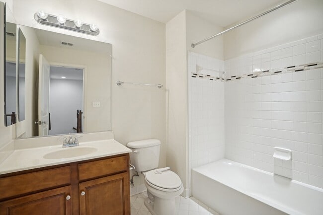 Building Photo - This beautiful townhome spans three finished levels and over 2800 square feet.