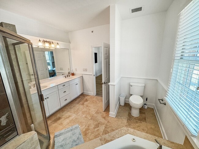 Building Photo - Fully Furnished Waterfront Elegance on Mai...