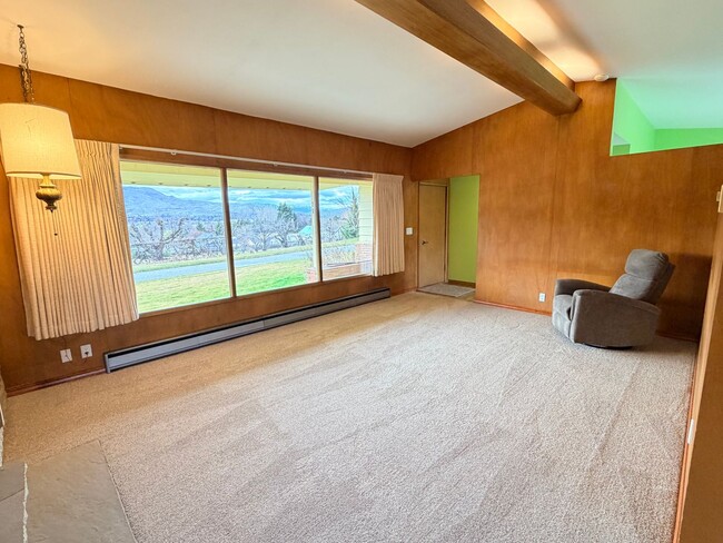 Building Photo - Country like setting! Spacious 3+ bed/ 1.5 bath house with garage, large yard, private deck and a...