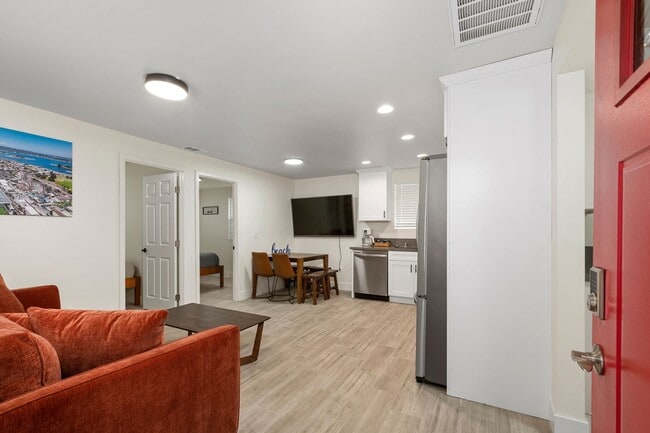 Building Photo - Beachside 3BR Home | Remodeled | AC | Garage Parking | Walk to Boardwalk