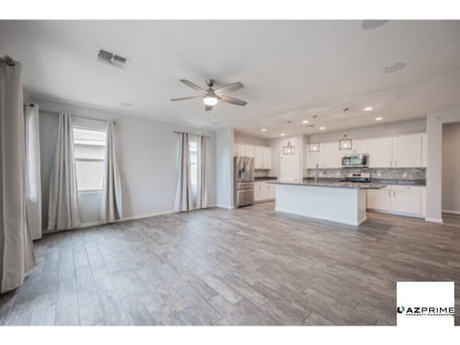 Building Photo - Discover Refined Peoria Living In This Stunning 3/3 + Den Masterpiece In Sought-After Coldwater Ranc