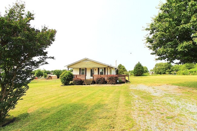 Building Photo - Remodeled 2 Bedroom with a covered porch!