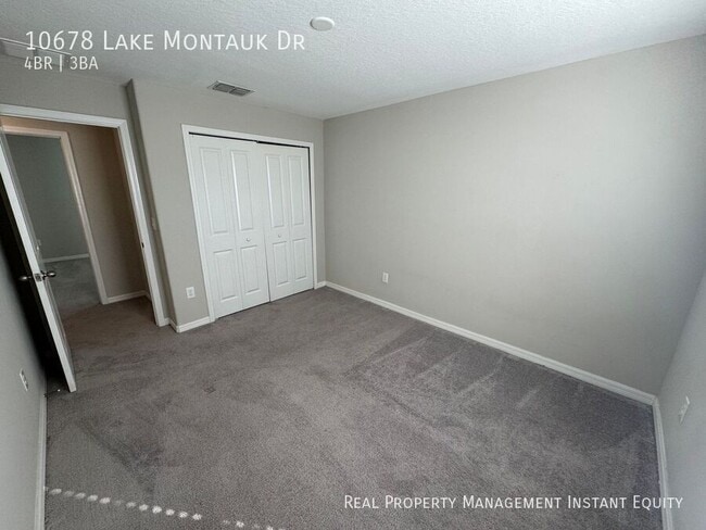 Building Photo - 10678 Lake Montauk Dr