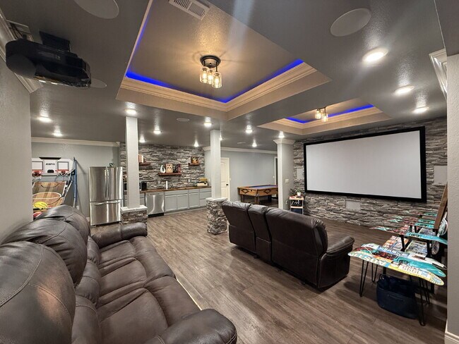 Building Photo - Custom 5 BR / 3 Car Garage, Home theater, ...