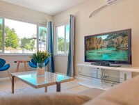 Building Photo - Modern Retreat with Spacious Yard & Cozy Interiors