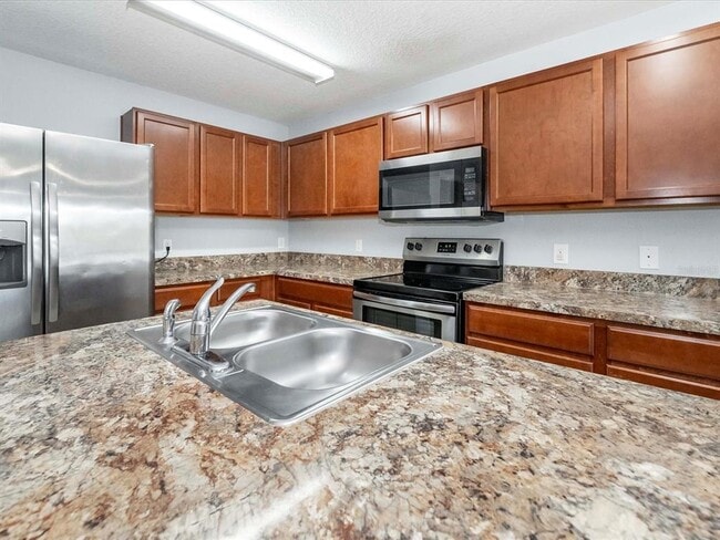 Building Photo - 5555 Maggiore Blvd