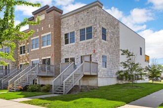 Building Photo - Spacious Townhome with Heated Garage Just ...