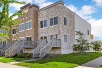 Building Photo - Spacious Townhome with Heated Garage Just ...