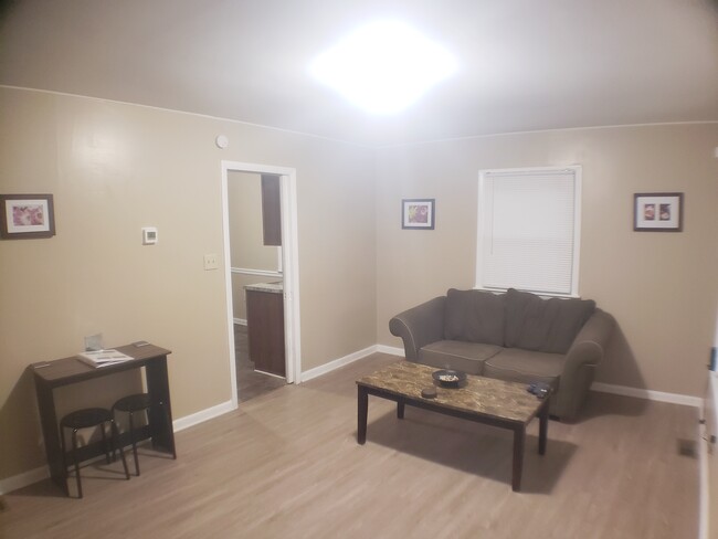 Eat-In Living Room with Pocket Door, Table/stools (that can also be used as a workspace area) - 3633 N 6th St