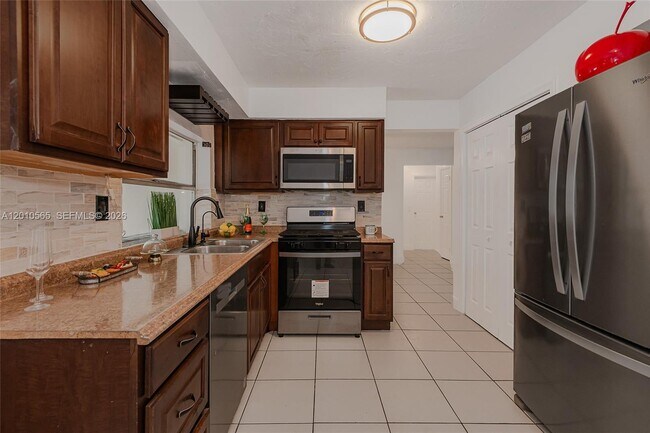 Building Photo - 8690 NW 24th Pl