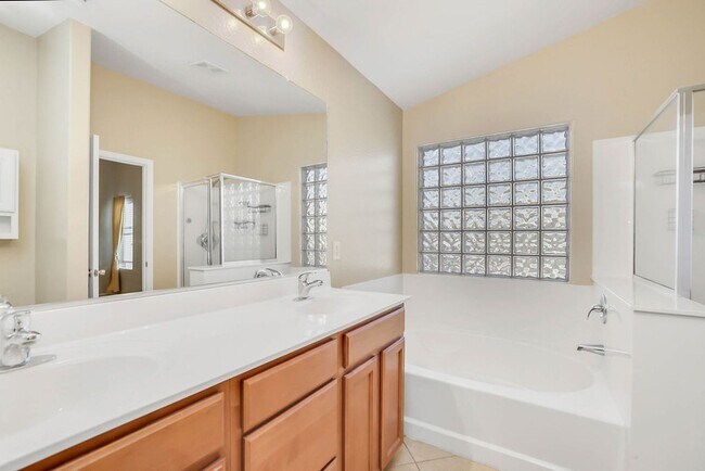 Building Photo - **Stunning 4-Bedroom, 3-Full Bath Home with Double Master Suites and Den