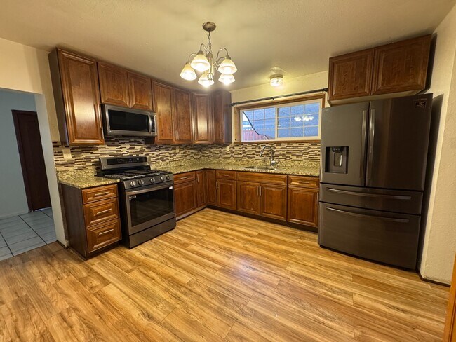 Building Photo - Classic Denver Home: 3 Beds, Updated Kitchen, Private Yard, Parking