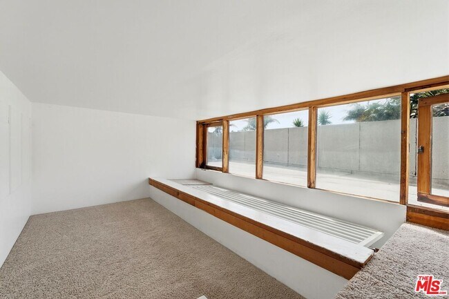 Building Photo - 6456 Surfside Way