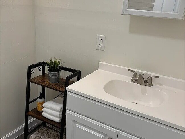 Building Photo - Remodeled 3-bedroom ranch house with HVAC, vinyl windows, garage and large private yard.
