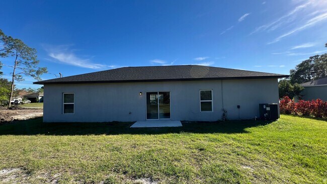 Building Photo - Beautiful 3 Bedroom Palm Bay Home with Upgrades & No Water Bill!