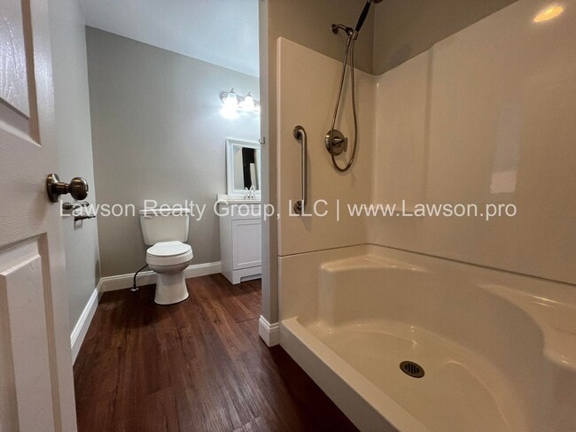 Building Photo - One Level Living- Beautifully Landscaped Yard and Attached Carport