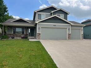 Building Photo - Spacious 5-Bedroom Home with Finished Base...