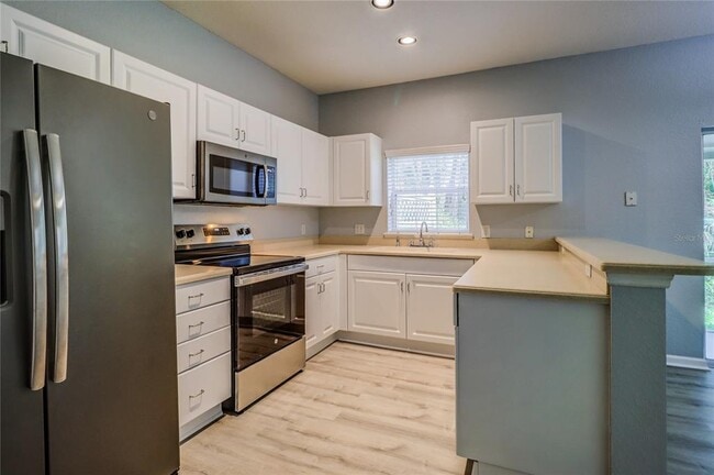 Building Photo - 6265 Ashbury Palms Dr