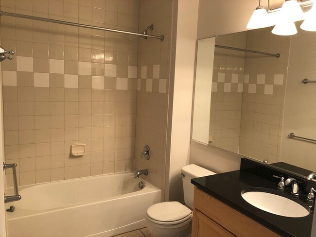 Building Photo - Two-Level Condo Walk in Heart of Revitaliz...