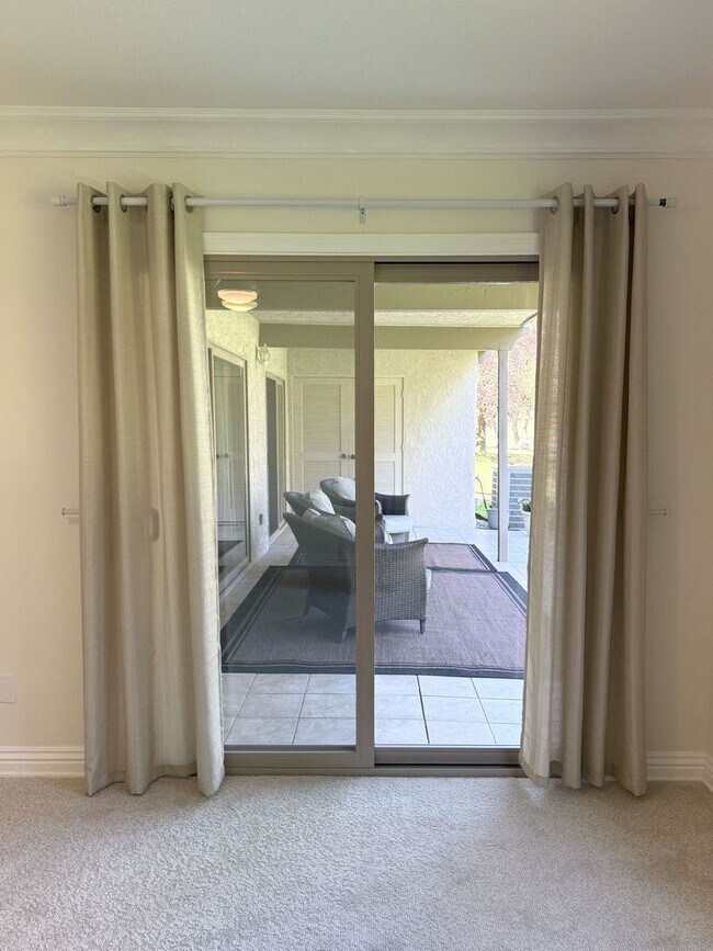 Building Photo - Enjoy stunning panoramic views of the golf...