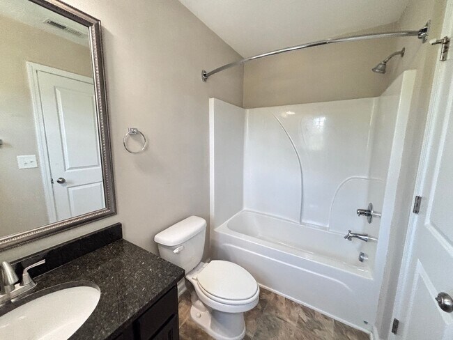 Building Photo - Modern 2-Bedroom Suite Home Near Hospitals...